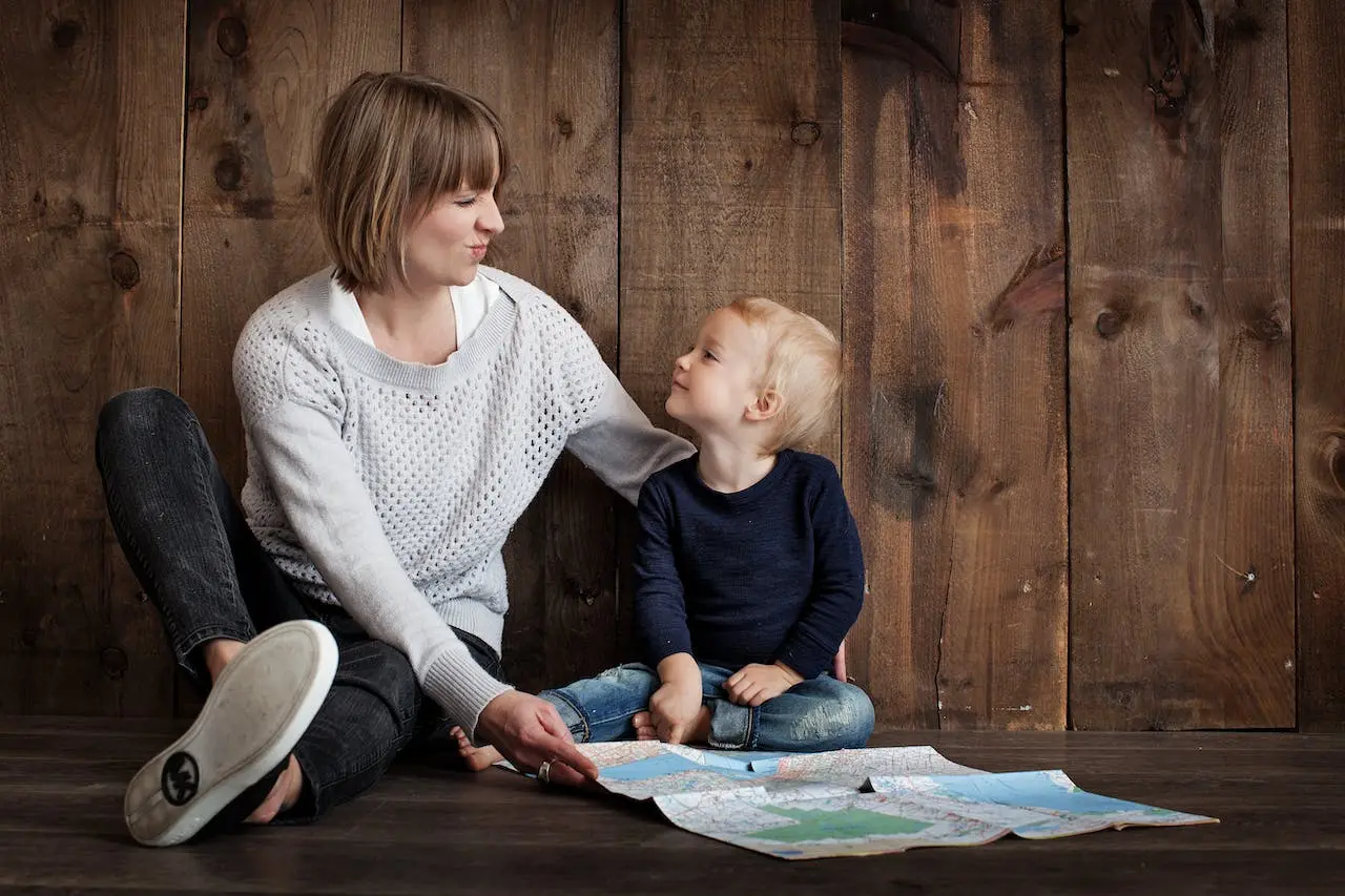 Mother showing a map for her kid